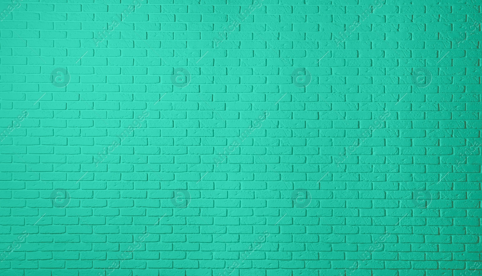 Image of Texture of turquoise color brick wall as background