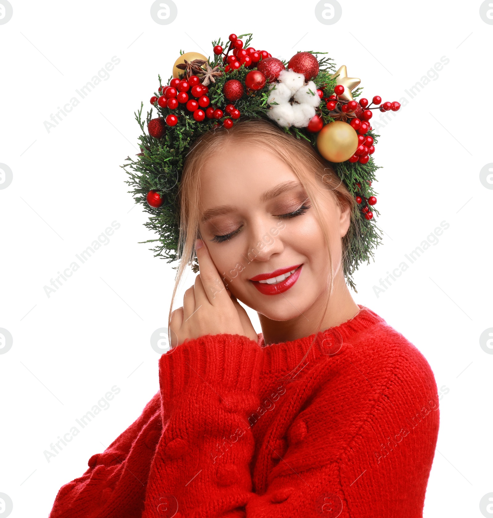 Photo of Beautiful young woman wearing Christmas wreath on white background