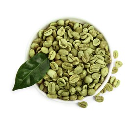 Bowl with green coffee beans and fresh leaf on white background, top view