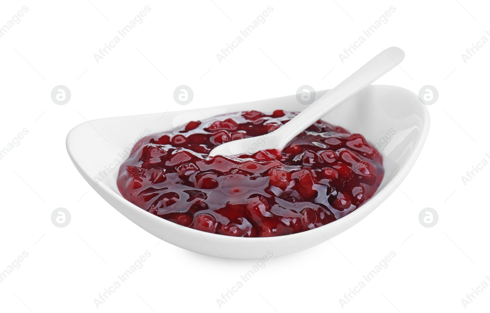 Photo of Fresh cranberry sauce in bowl isolated on white