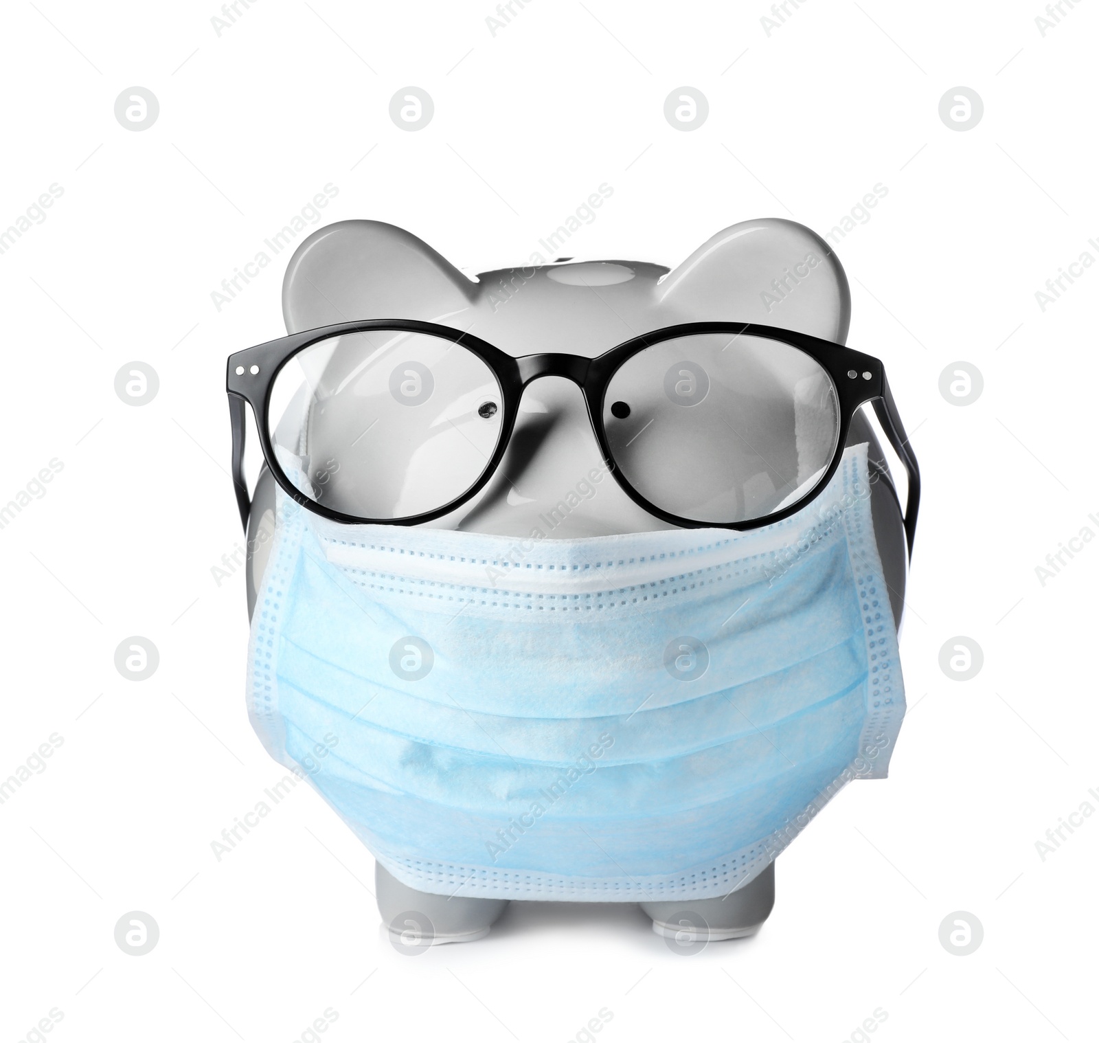 Photo of Piggy bank with glasses and face mask isolated on white