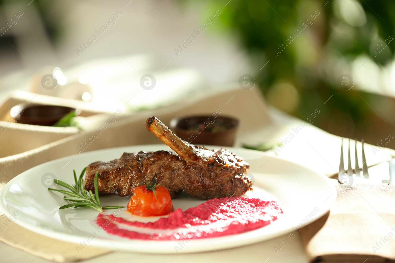 Photo of Delicious roasted rib served on white table