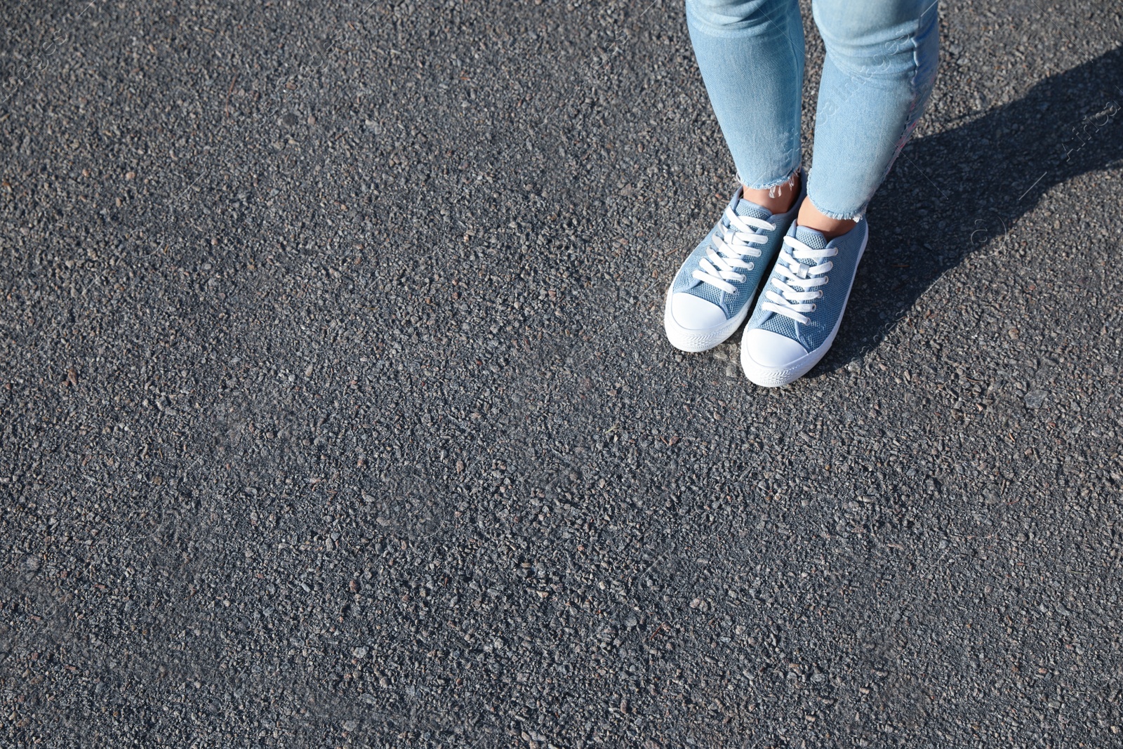 Photo of Woman standing outdoors, closeup with space for text. Choosing way concept.