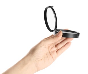 Photo of Woman holding black pocket powder with mirror on white background, closeup. Cosmetic product