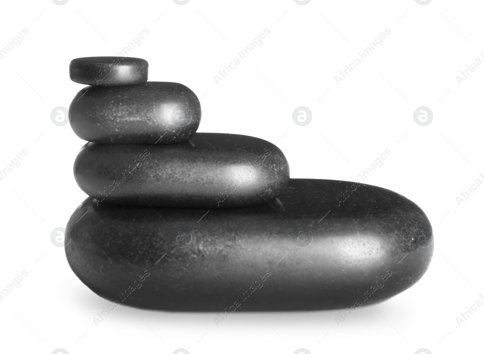 Photo of Stack of zen spa stones on white background