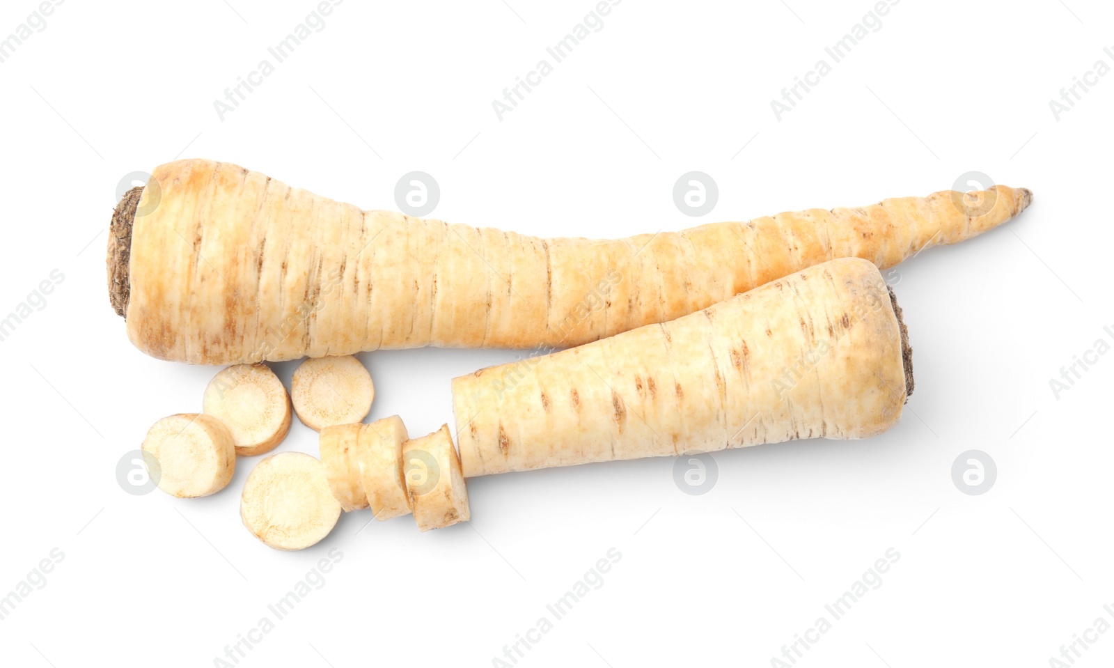 Photo of Raw parsley roots isolated on white, top view