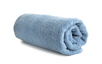 Rolled soft terry towel on white background