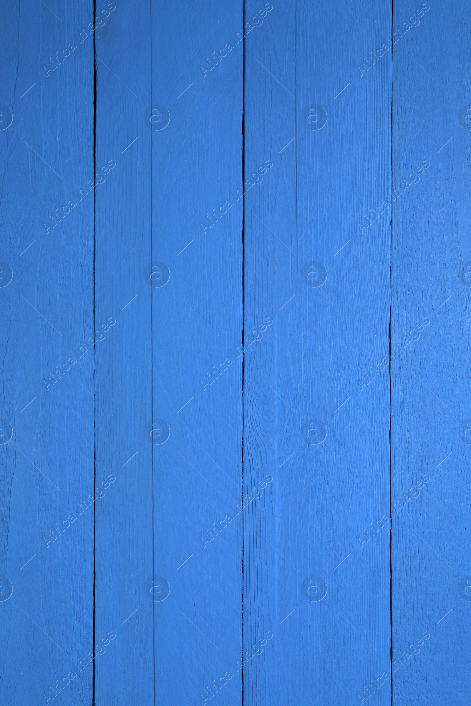 Photo of Texture of dark blue wooden surface as background, closeup
