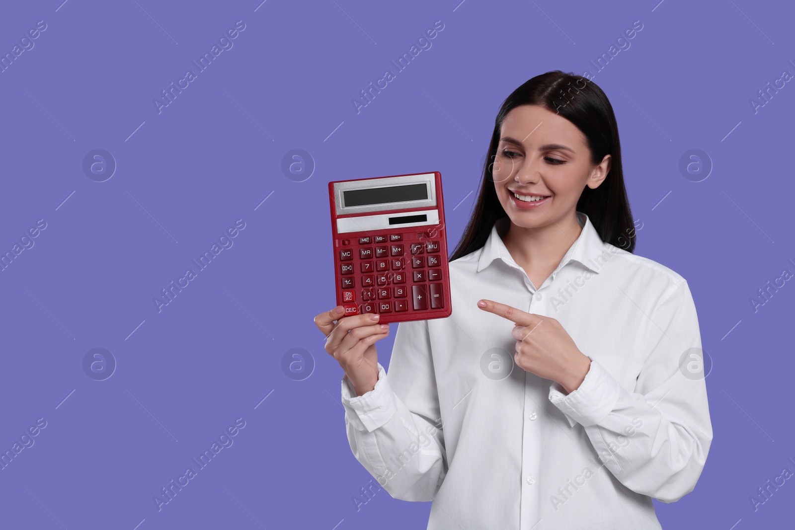 Photo of Smiling accountant with calculator on purple background, space for text