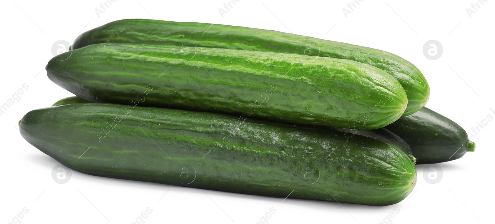 Photo of Many long fresh cucumbers isolated on white