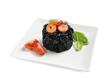 Delicious black risotto with seafood isolated on white