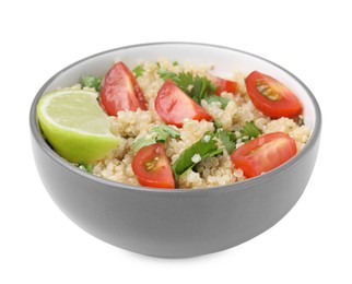 Photo of Delicious quinoa salad with tomatoes, parsley and lime isolated on white