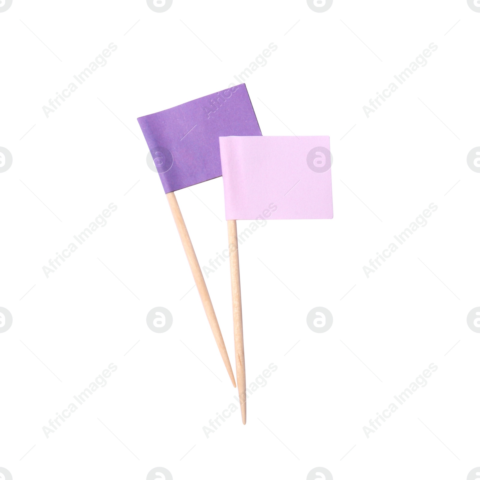 Photo of Small colorful paper flags on white background, top view