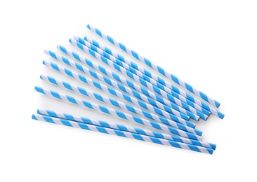 Photo of Striped paper cocktail straws on white background