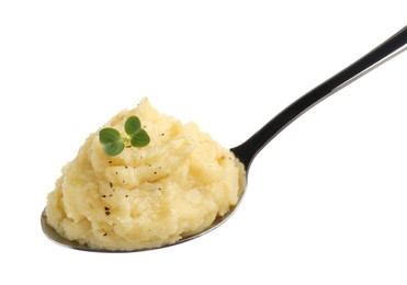 Photo of Spoon of tasty mashed potatoes with microgreen and black pepper isolated on white