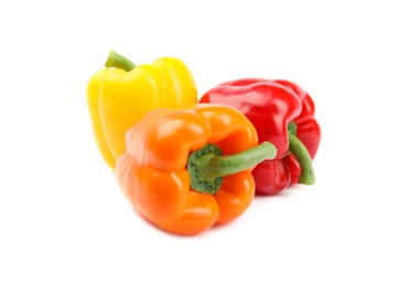 Photo of Fresh ripe bell peppers on white background