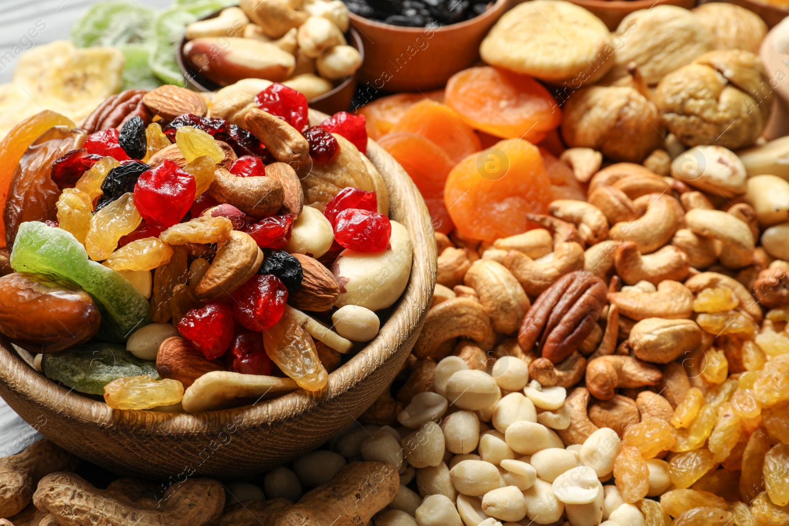 Photo of Composition of different dried fruits and nuts, closeup