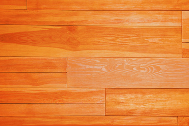 Image of Texture of orange wooden surface as background. Simple design