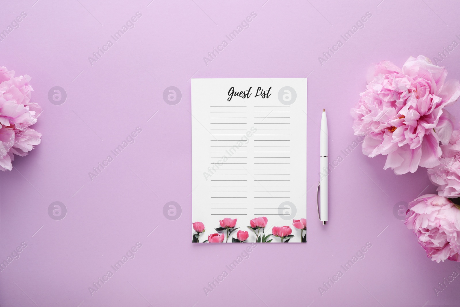 Photo of Guest list, pen and beautiful flowers on violet background, flat lay. Space for text