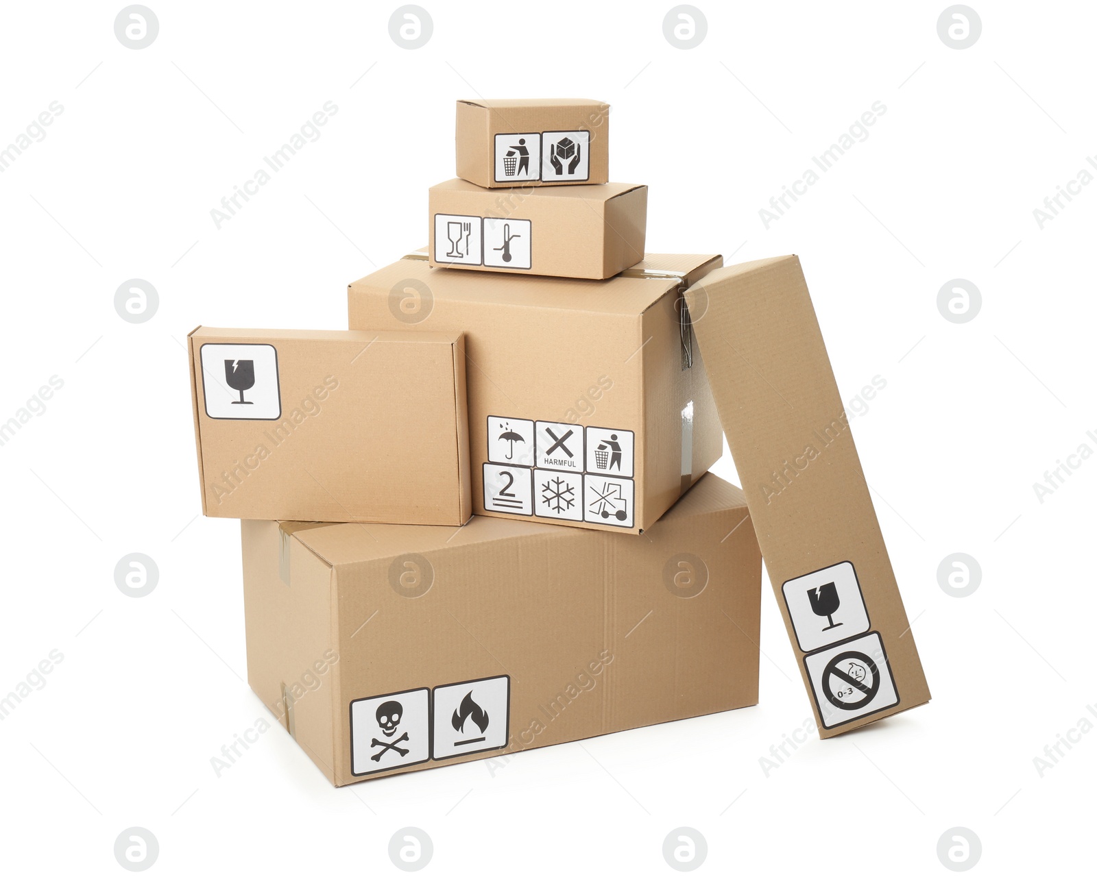 Photo of Cardboard boxes with different packaging symbols on white background. Parcel delivery