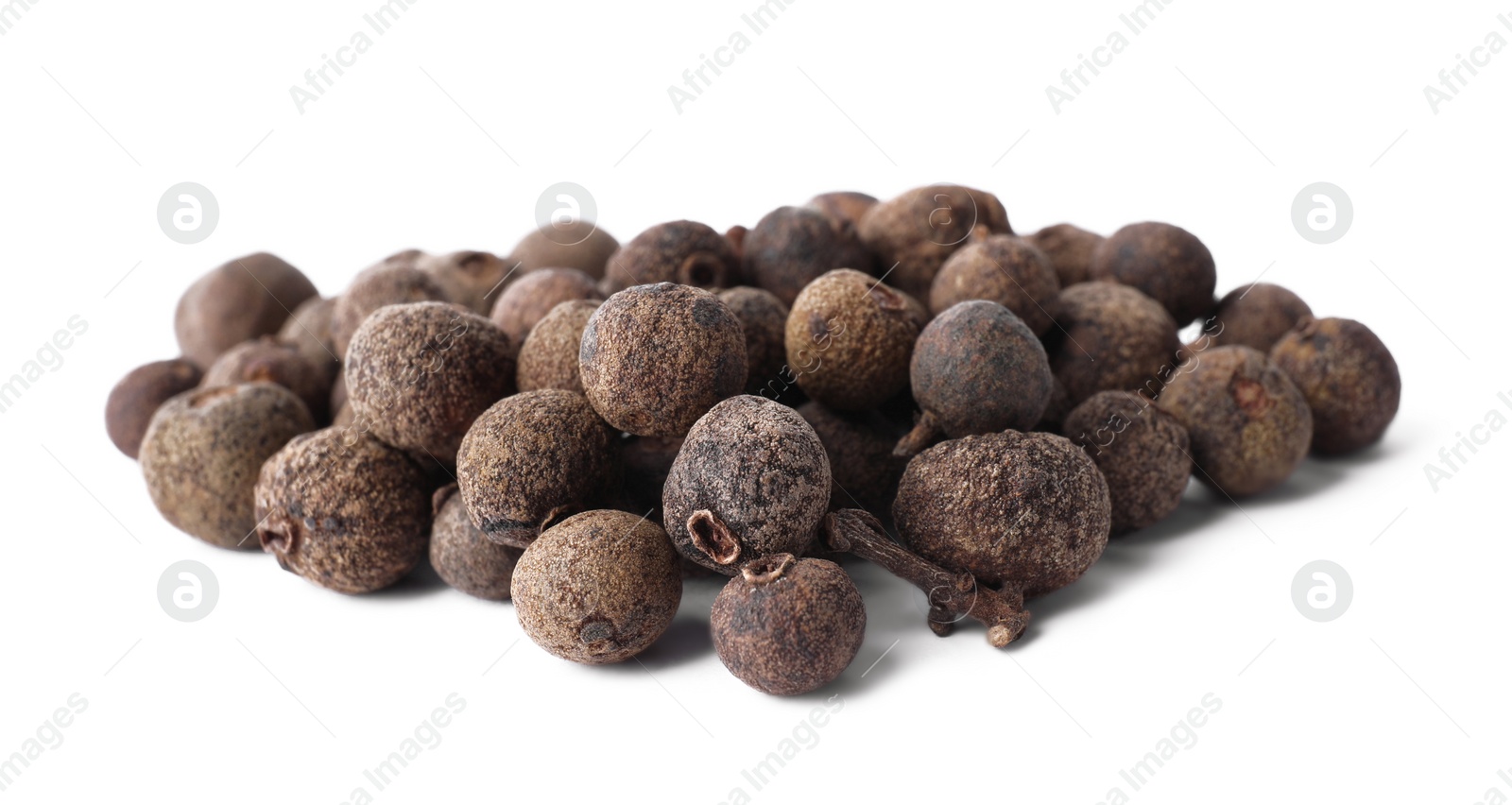 Photo of Heap of black pepper grains isolated on white