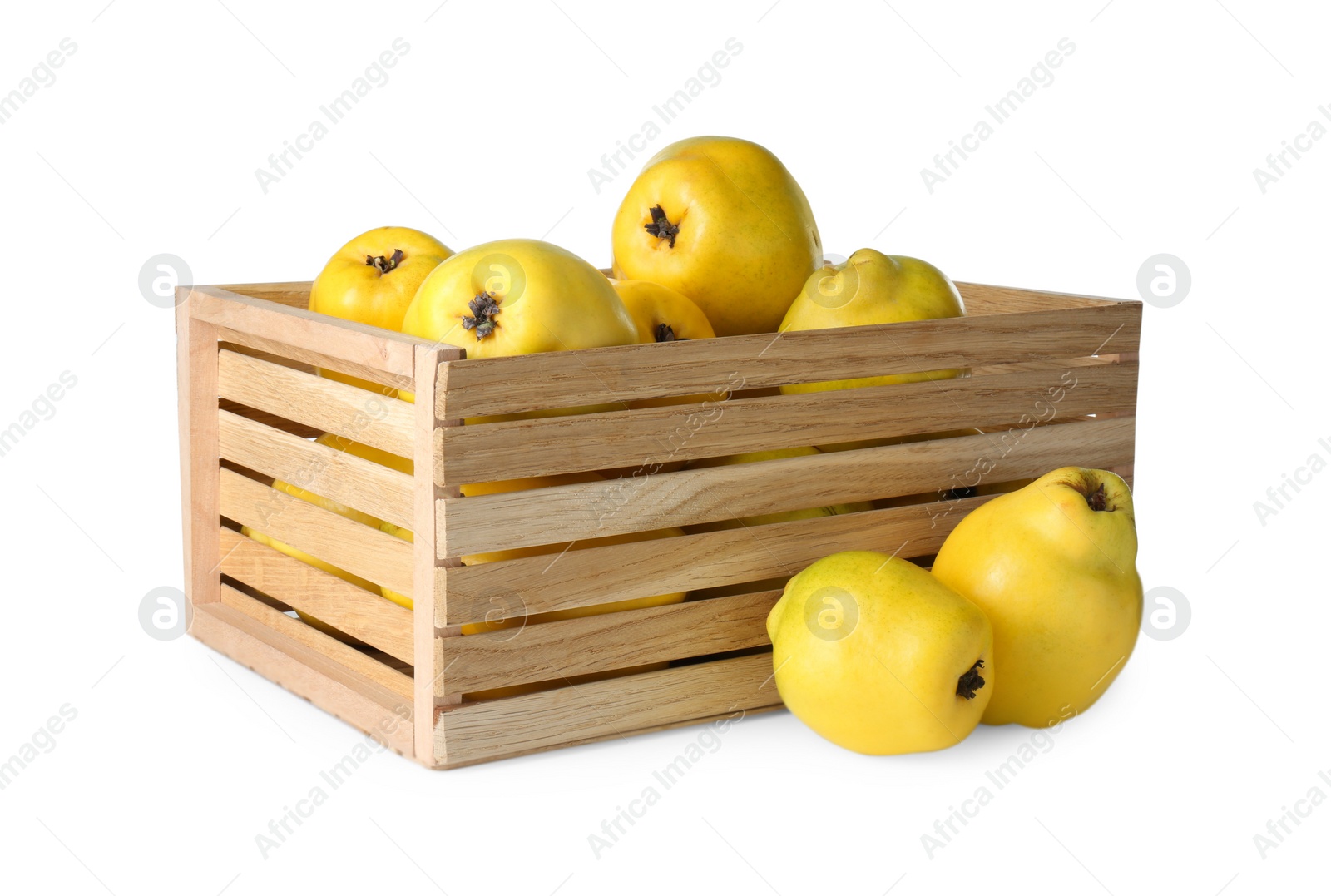 Photo of Wooden crate with delicious fresh ripe quinces isolated on white