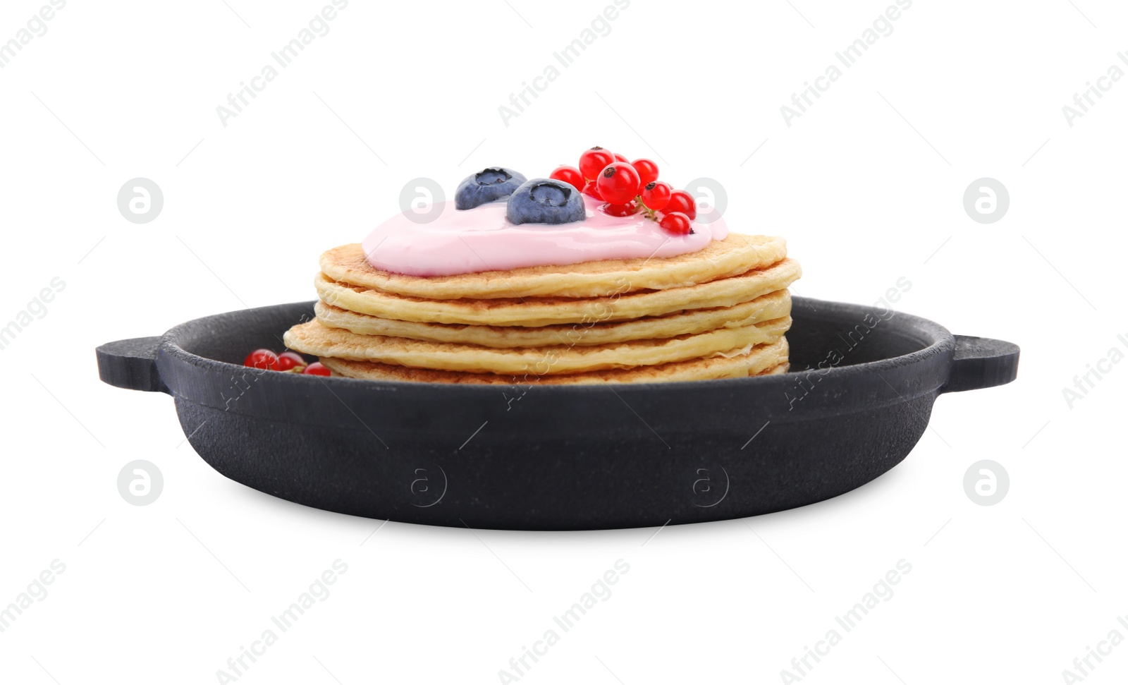 Photo of Tasty pancakes with natural yogurt, blueberries and red currants on white background