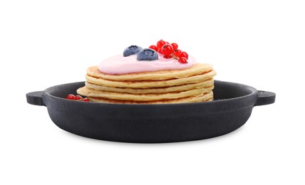 Photo of Tasty pancakes with natural yogurt, blueberries and red currants on white background