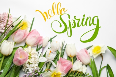 Image of Hello Spring. Beautiful flowers on white background, flat lay