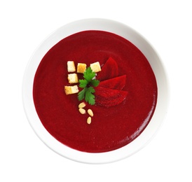 Photo of Dish with beet cream soup on white background, top view. Healthy food