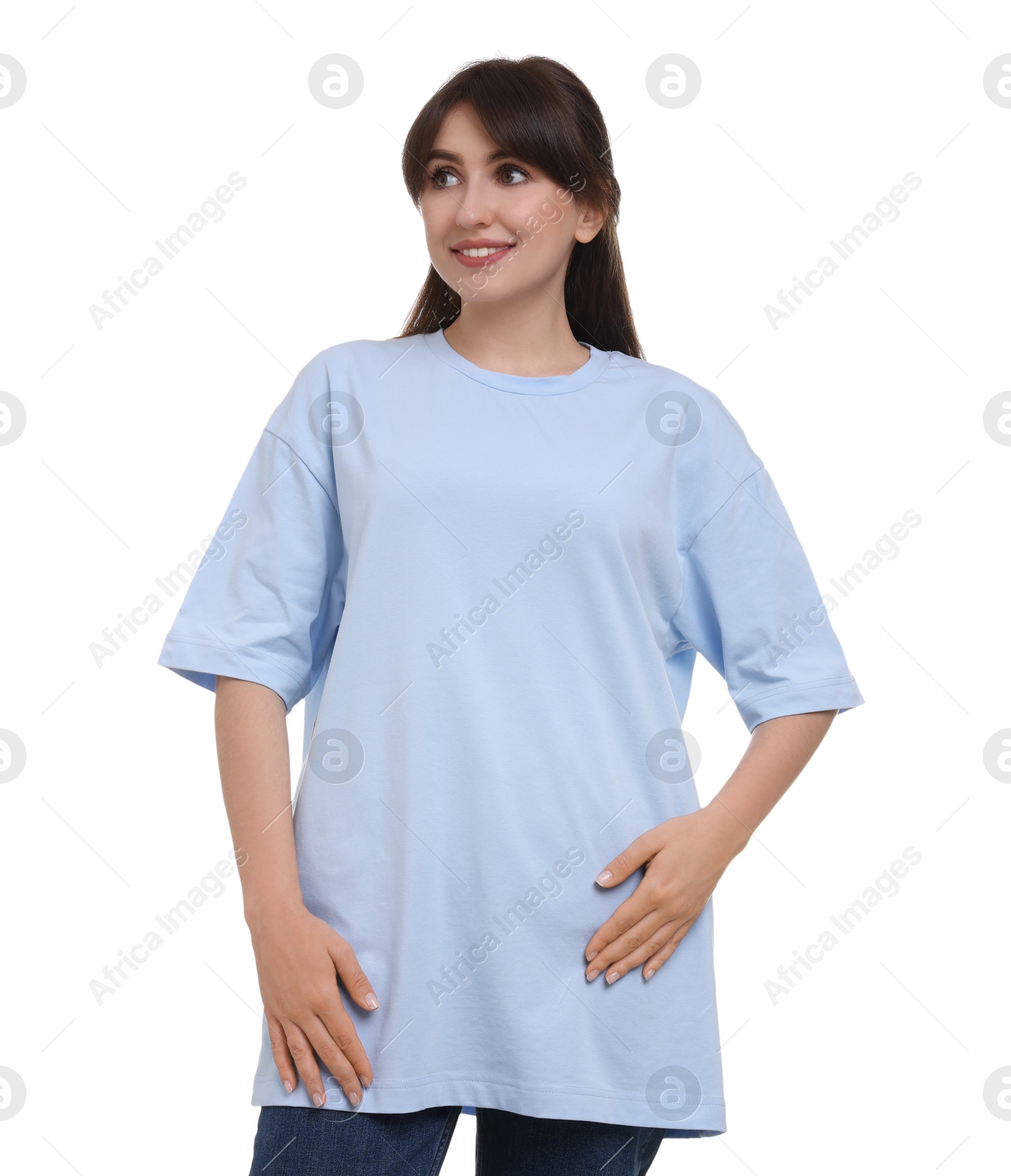 Photo of Smiling woman in stylish light blue t-shirt on white background