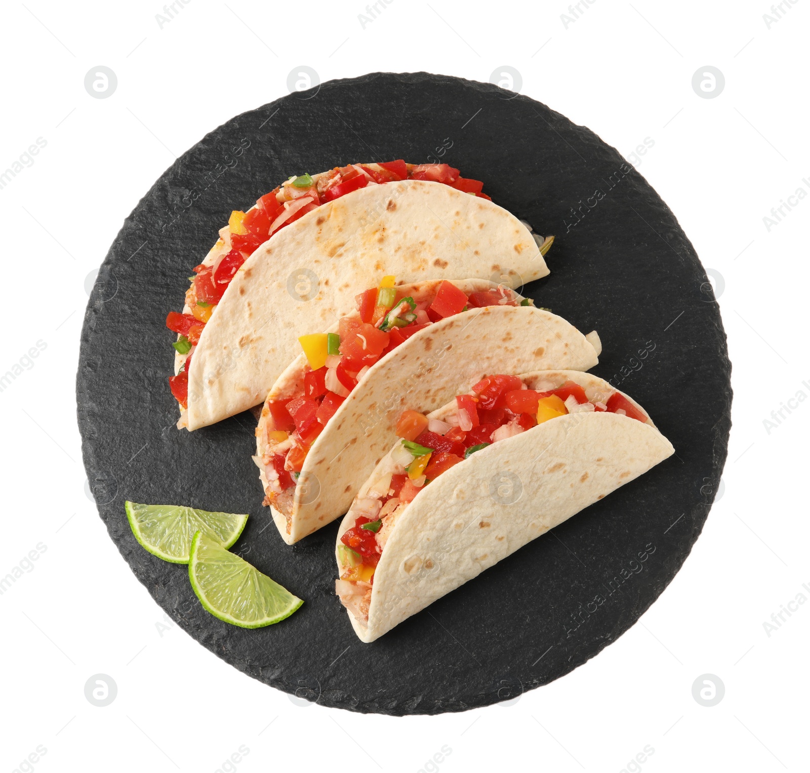 Photo of Delicious tacos with vegetables and slices of lime isolated on white, top view