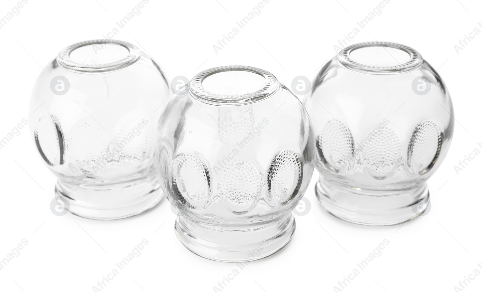 Photo of Glass cups isolated on white. Cupping therapy