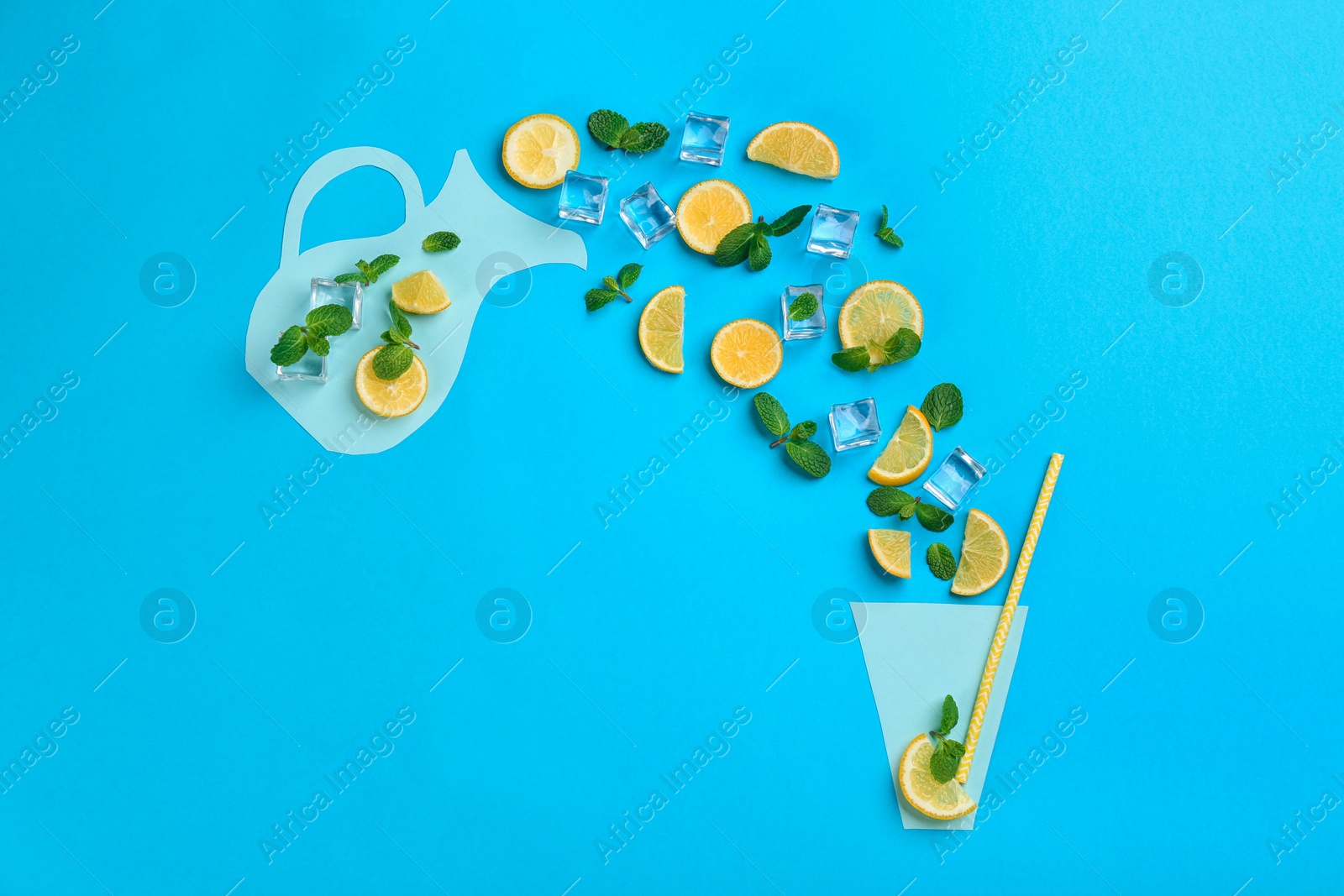 Photo of Creative lemonade layout with lemon slices, mint and ice on blue background, top view