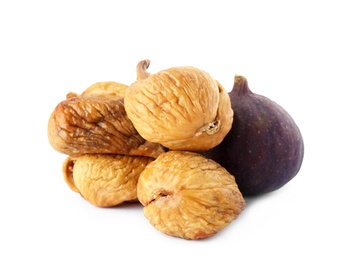 Tasty dried and raw figs on white background