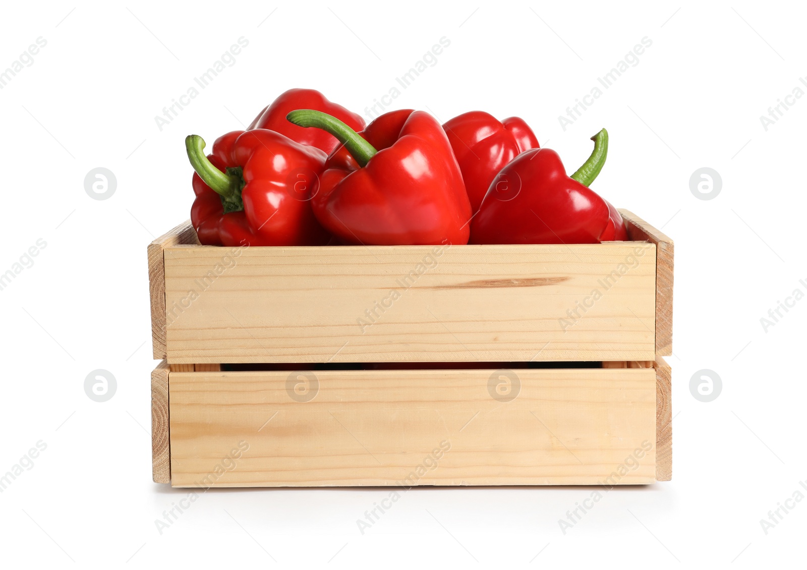 Photo of Wooden crate with tasty bell peppers on white background