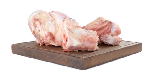 Photo of Board with raw chopped meaty bones on white background