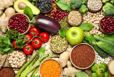 Different vegetables, seeds and fruits as background, closeup. Healthy diet