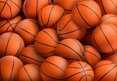 Image of Many orange basketball balls as background 