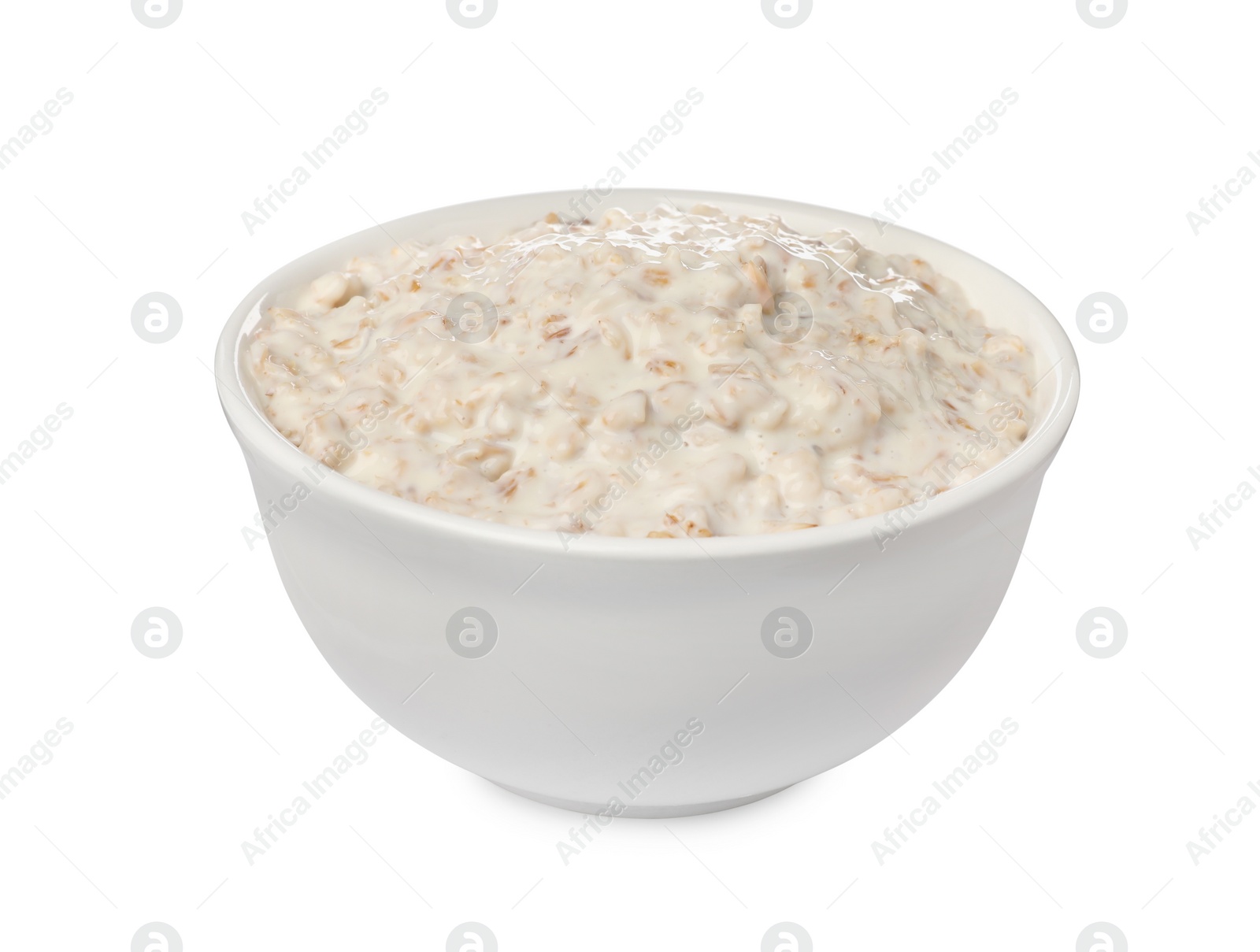 Photo of Tasty boiled oatmeal in bowl isolated on white