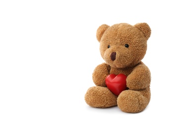 Photo of Cute teddy bear with red heart isolated on white. Valentine's day celebration