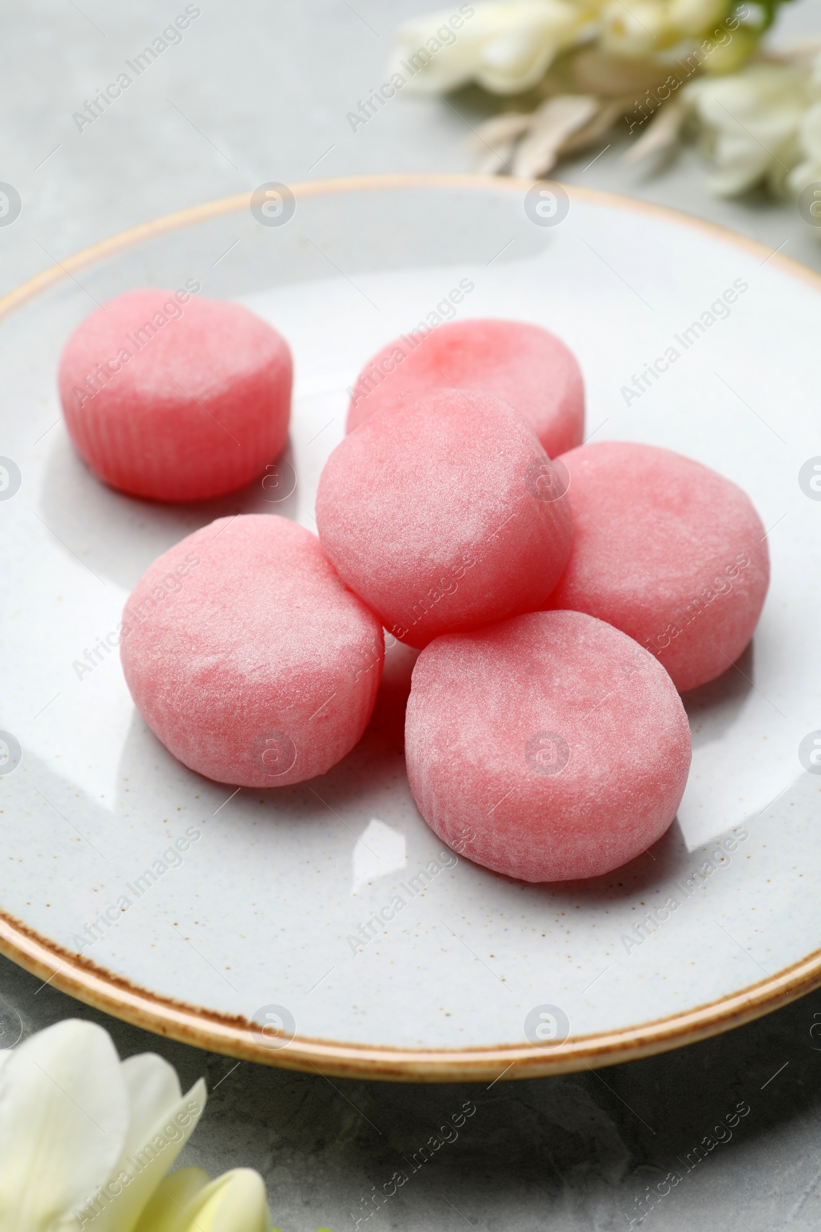 Photo of Delicious mochi on plate, closeup. Traditional Japanese dessert