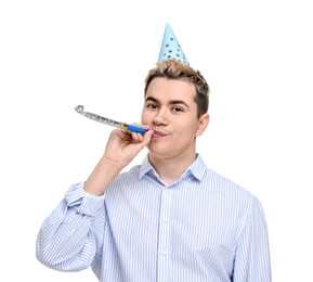 Photo of Young man with party hat and blower on white background