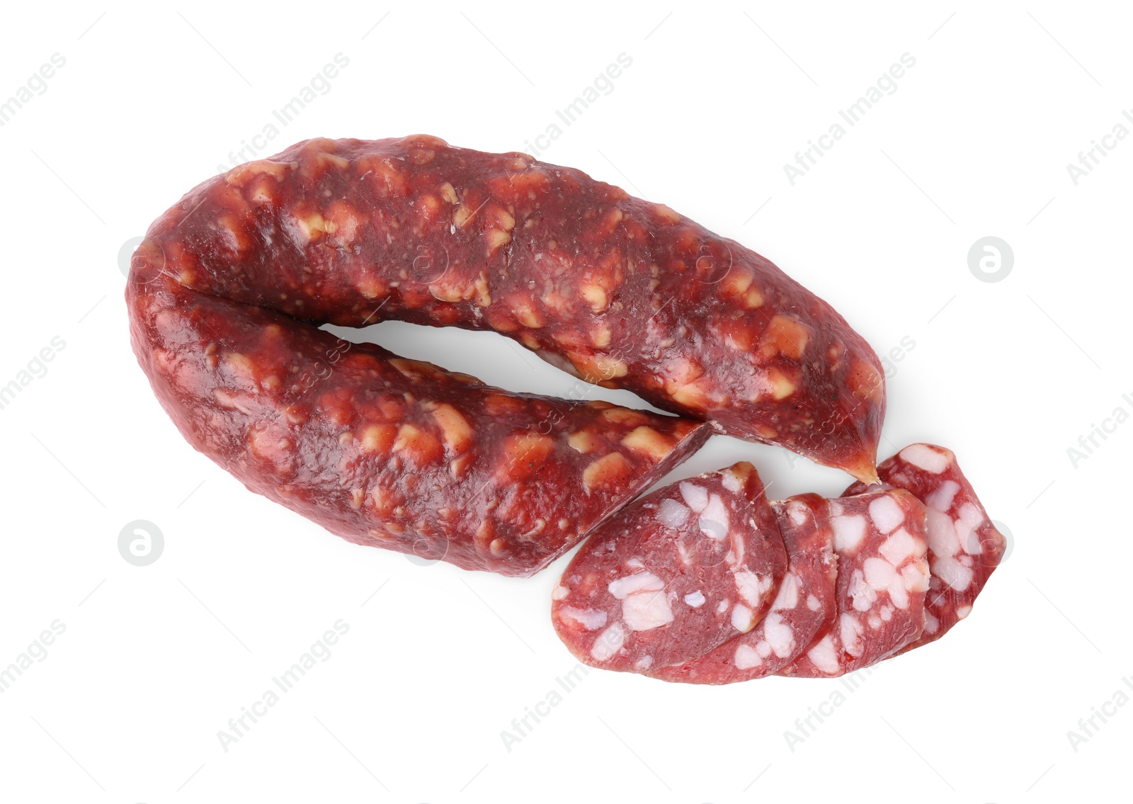 Photo of Delicious cut smoked sausage isolated on white, top view