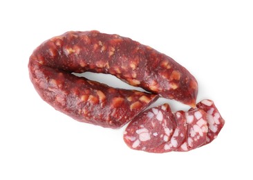 Delicious cut smoked sausage isolated on white, top view