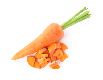 Whole and cut ripe carrots isolated on white, top view