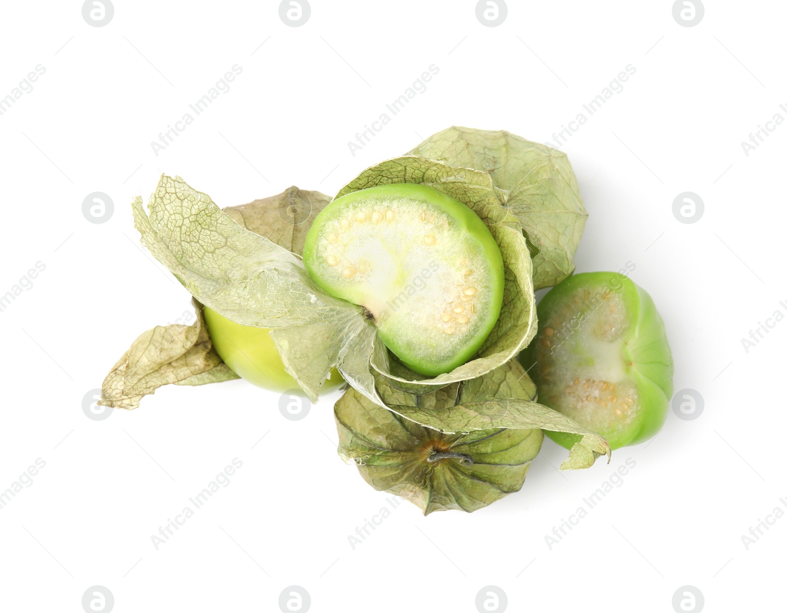 Photo of Fresh green tomatillos with husk isolated on white, top view