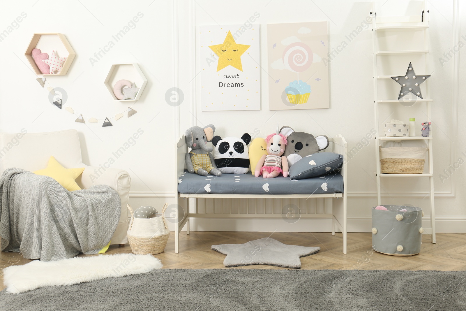 Photo of Child room interior with toys and stylish furniture
