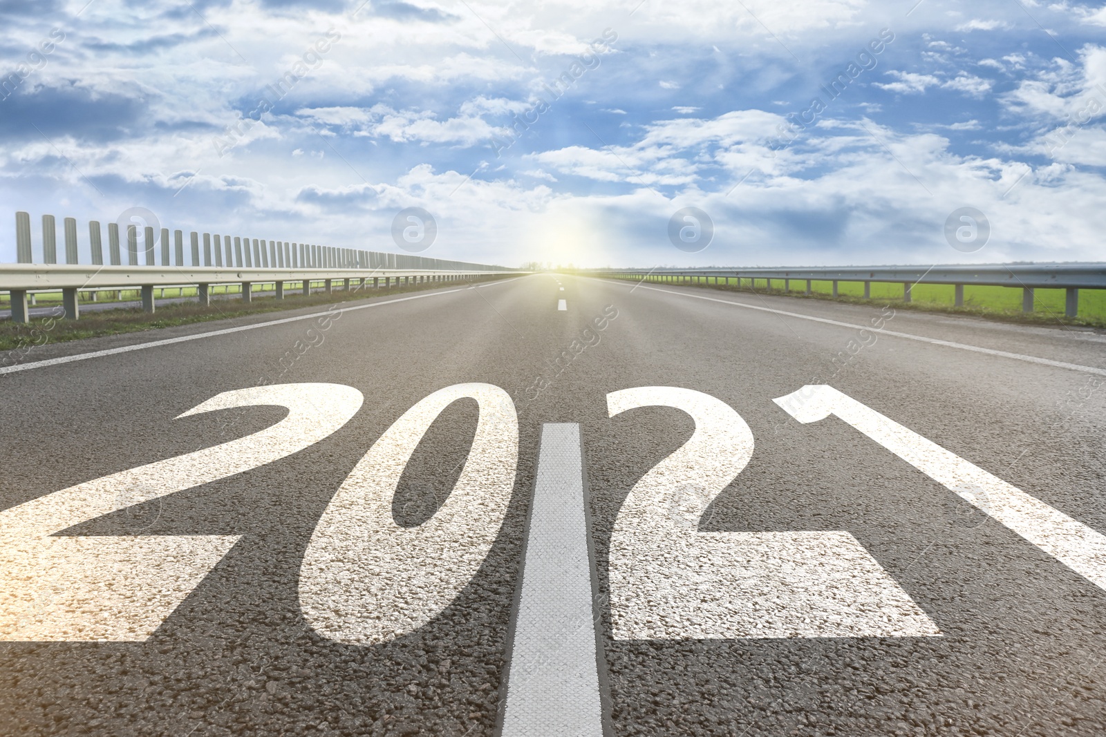 Image of Start new year with fresh vision and ideas. 2021 numbers on asphalt road 