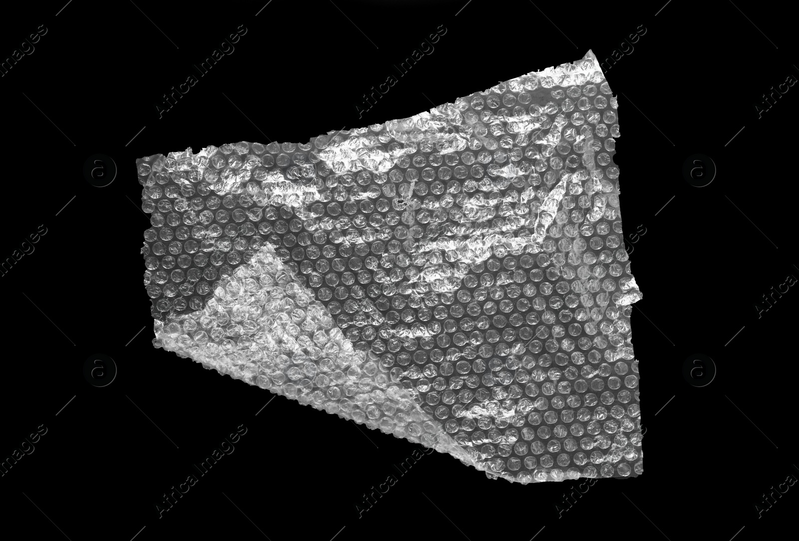 Photo of Transparent bubble wrap on black background, top view